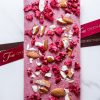 Шоколадная плитка из шоколада ручной работы “ФЬЮР” с добавлением натуральной малины и золотистого обжаренного миндаля.